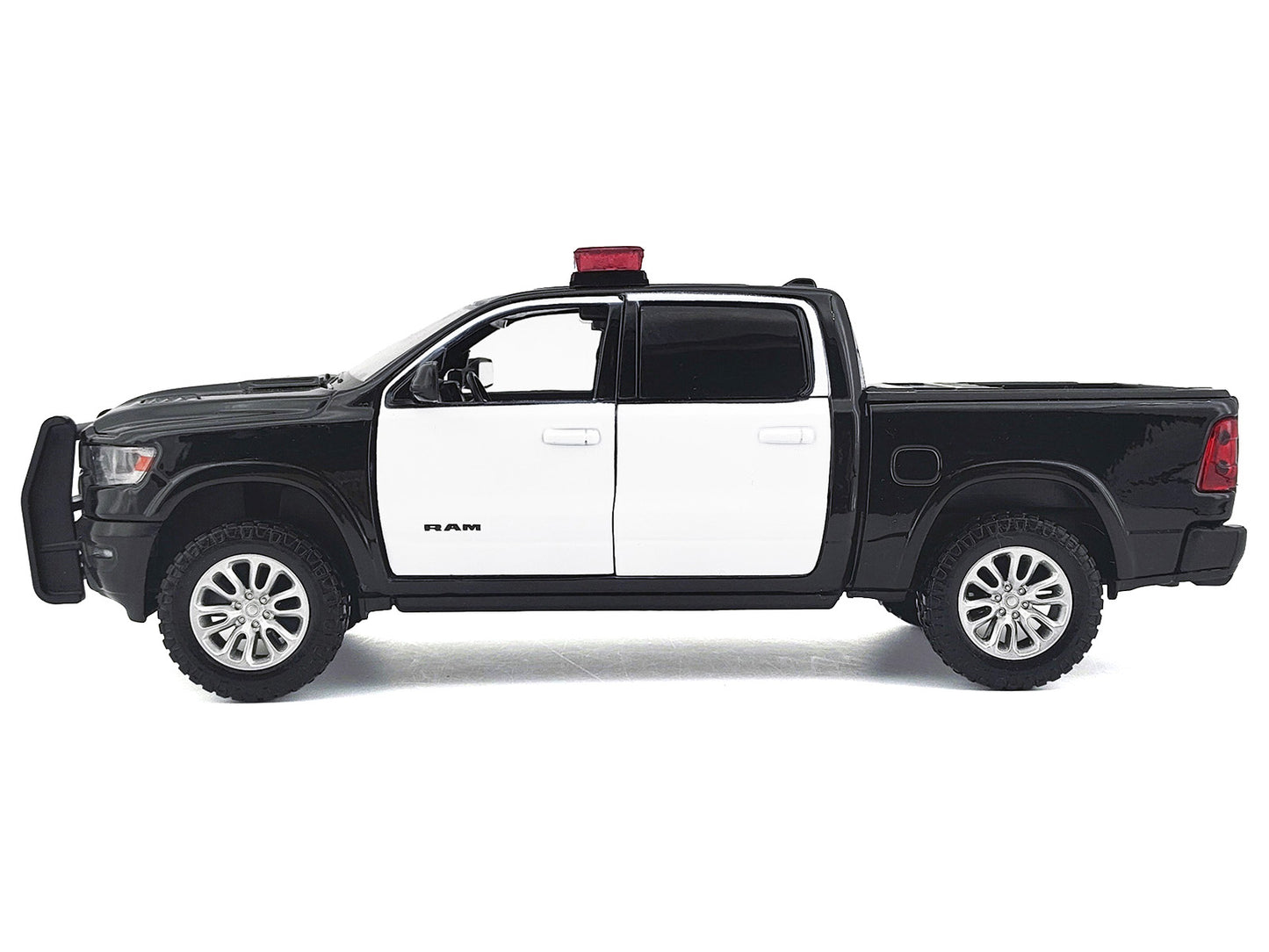 2019 RAM 1500 Laramie Crew Cab Pickup Truck Black and White with Flashing Light Bar and Front and Rear Lights and Sounds 1/27 Diecast Model Car by Motormax